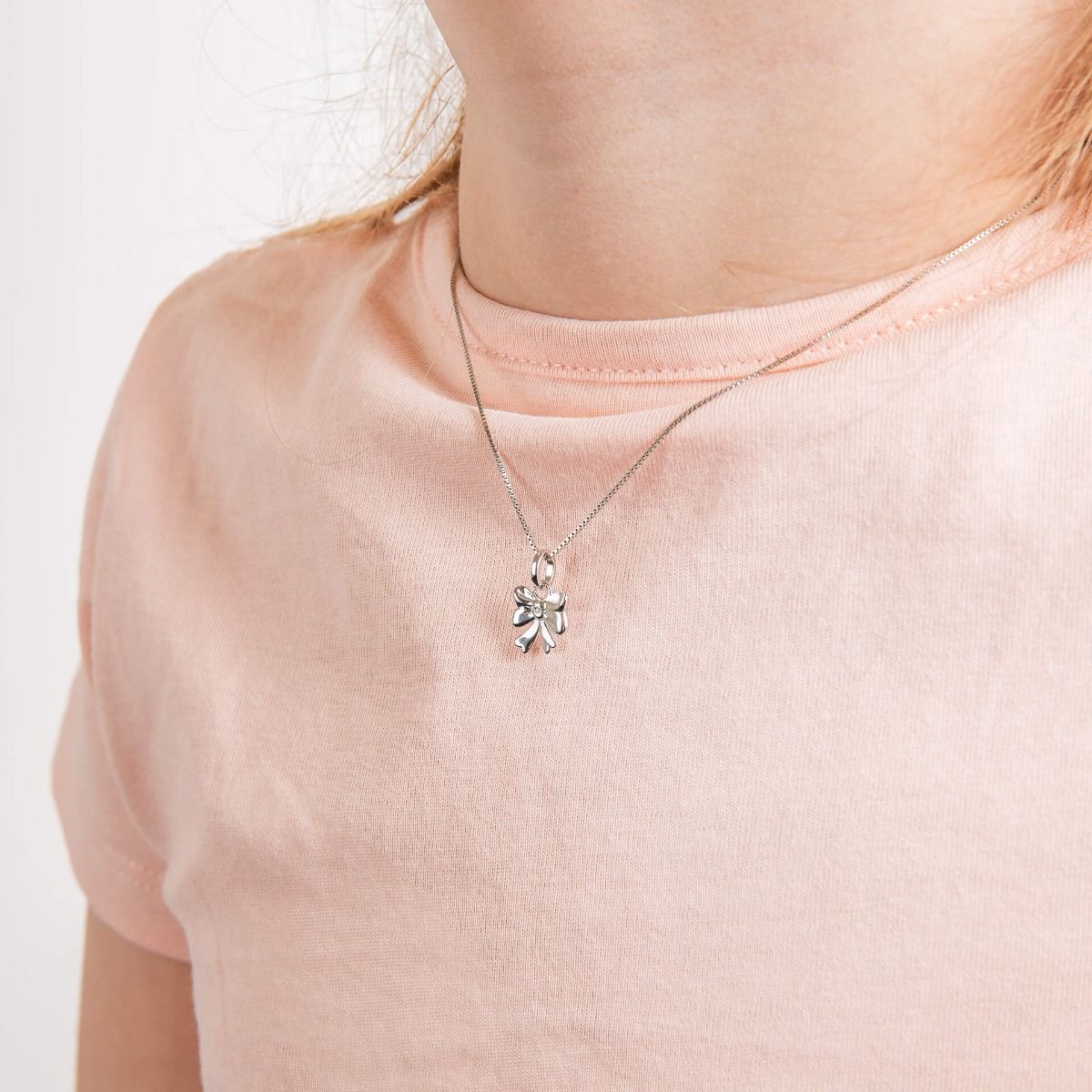 Sterling Silver Diamond Bow Pendant Necklace