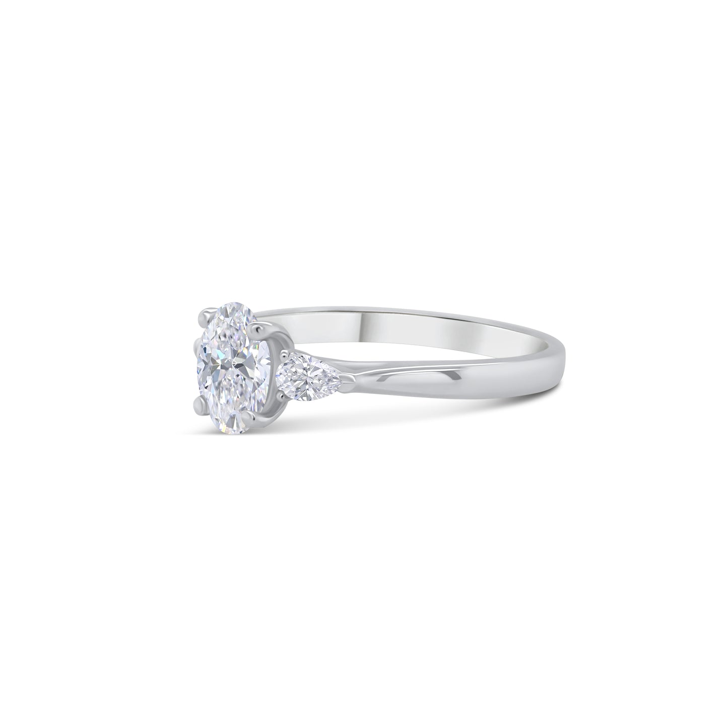 Platinum Oval & Pear Three Stone Diamond Ring, 0.91ct