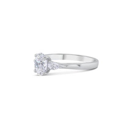 Platinum Oval & Pear Three Stone Diamond Ring, 0.91ct