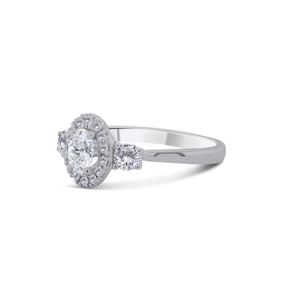 Platinum Oval & Brilliant Round Three Stone & Halo Diamond Ring, 0.71ct