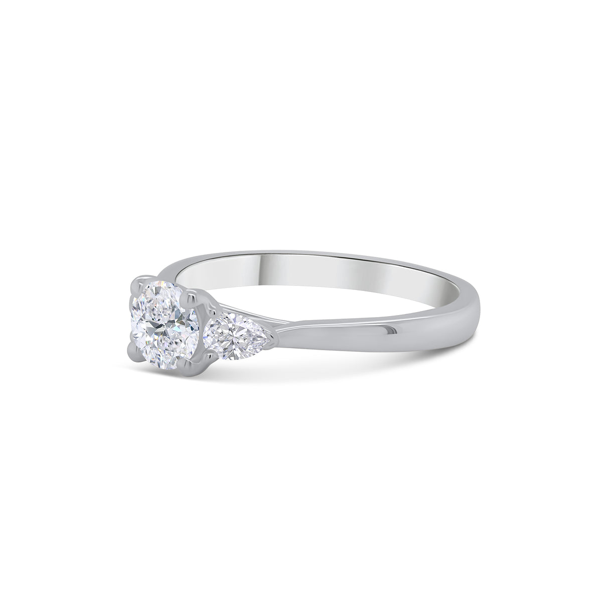 Platinum Brilliant Round & Pear Three Stone Diamond Ring, 0.58ct